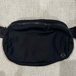 Lululemon Everywhere Bag - Black- outside zipper. Water repellent. Black.